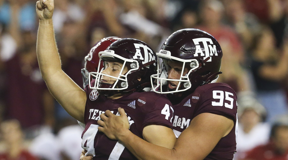 Texas A&M Aggies punter Nik Constantinou (95) celebrates Texas A&M Aggies place kicker Seth Small (47) 28 yard game game winning field goal against the Alabama Crimson Tide in the fourth quarter